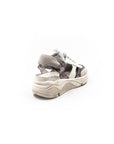 White sneaker with gray accents on a white background