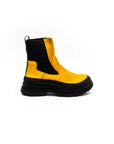 Yellow high rubber boots in burel.
