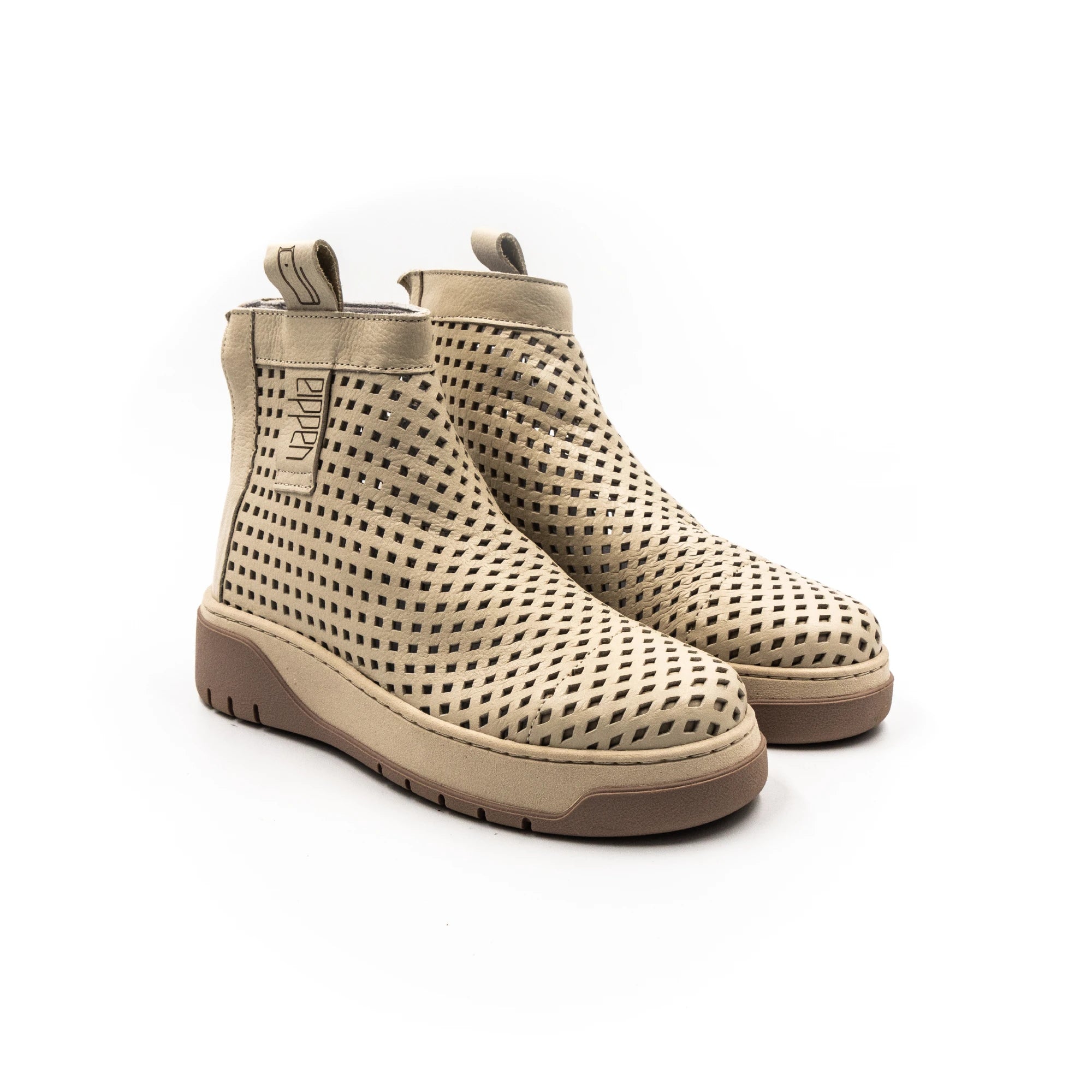 Perforated boots, cream color.