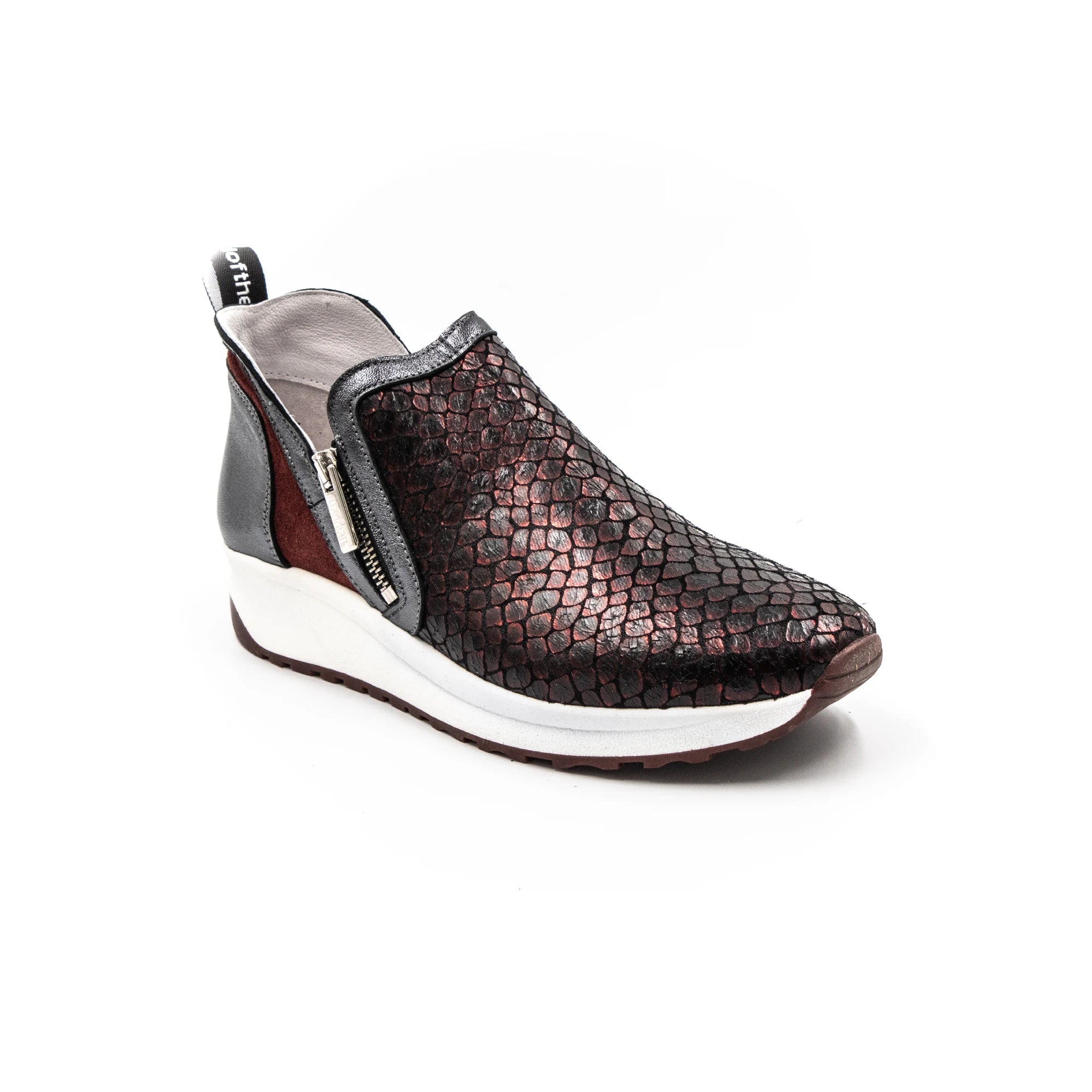 Red-toned sneakers with zippers.