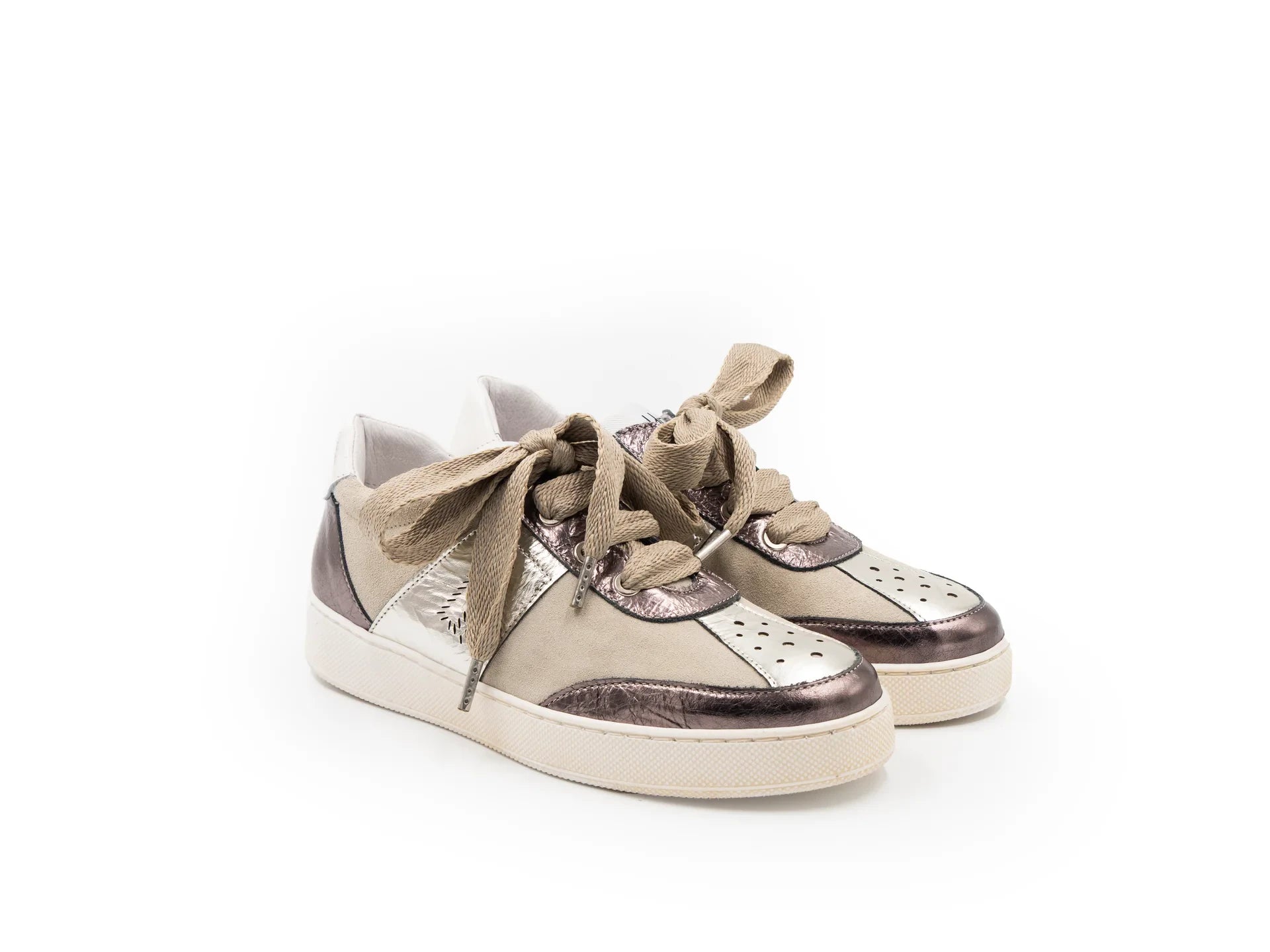 A beige and brown sneaker with a lace-up closure, featuring a low heel and a round toe shape.
