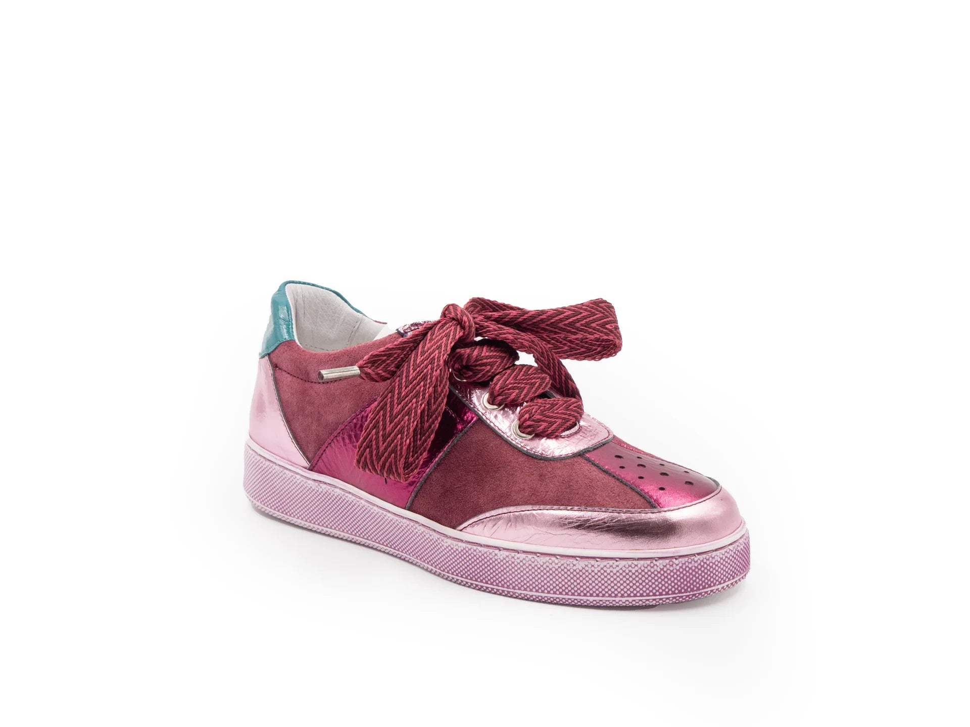 A pink sneaker with a lace-up closure, featuring a low heel and a round toe shape.
