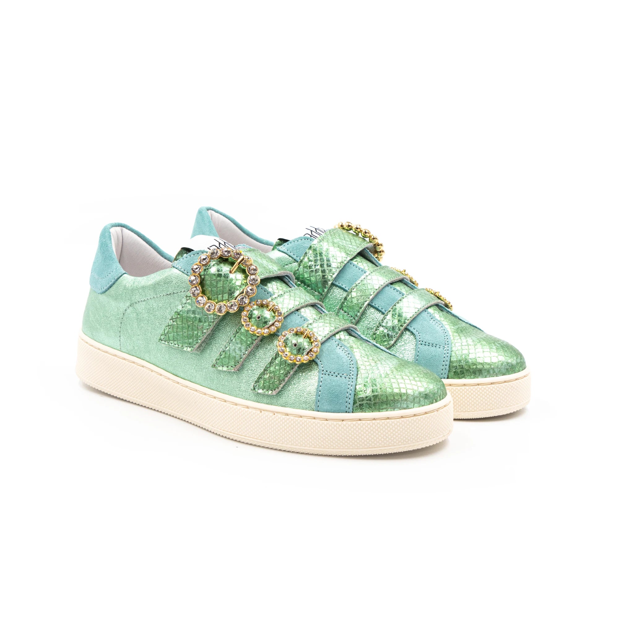 Green-toned sneakers with glittery buckles.