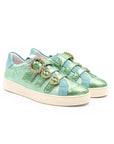 Green-toned sneakers with glittery buckles.