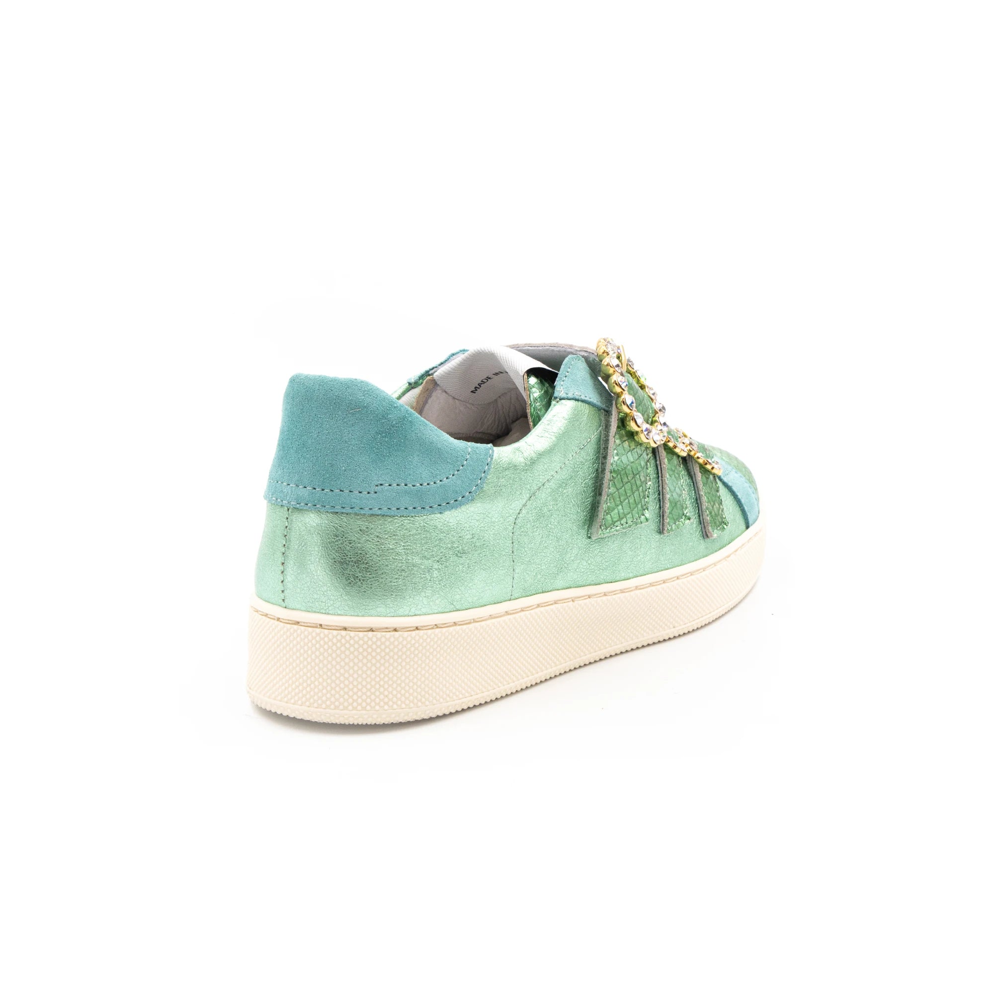 Green-toned sneakers with glittery buckles.