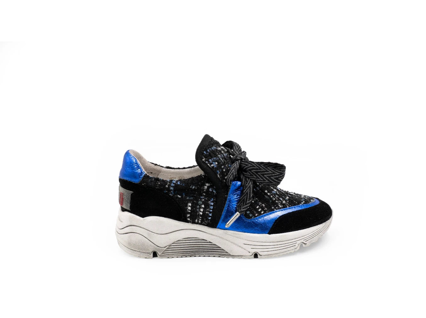 Black and blue glittery sneaker with a bow on a white background