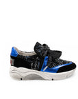 Black and blue glittery sneaker with a bow on a white background