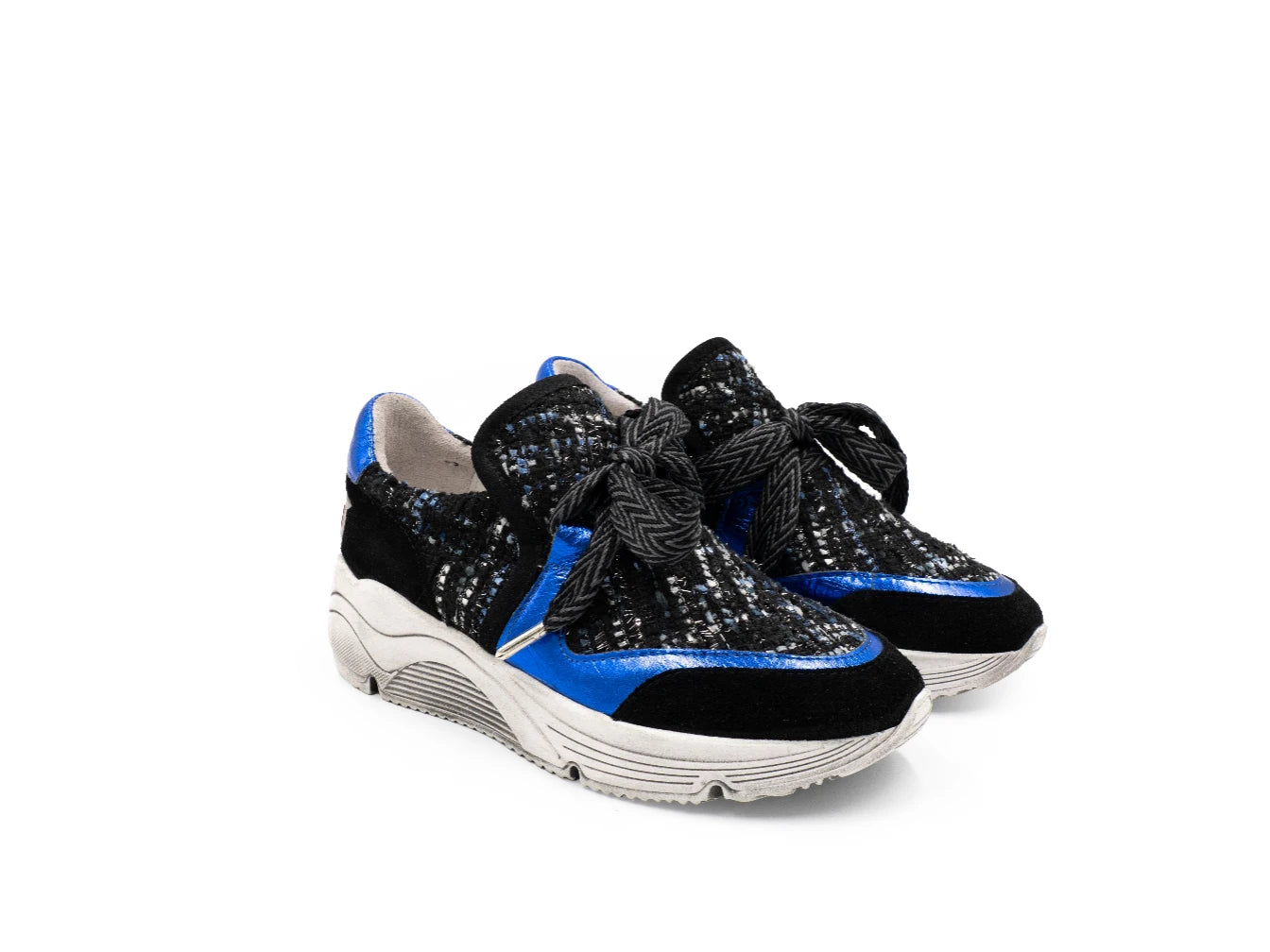 Black and blue sneakers with sequin details on a white background