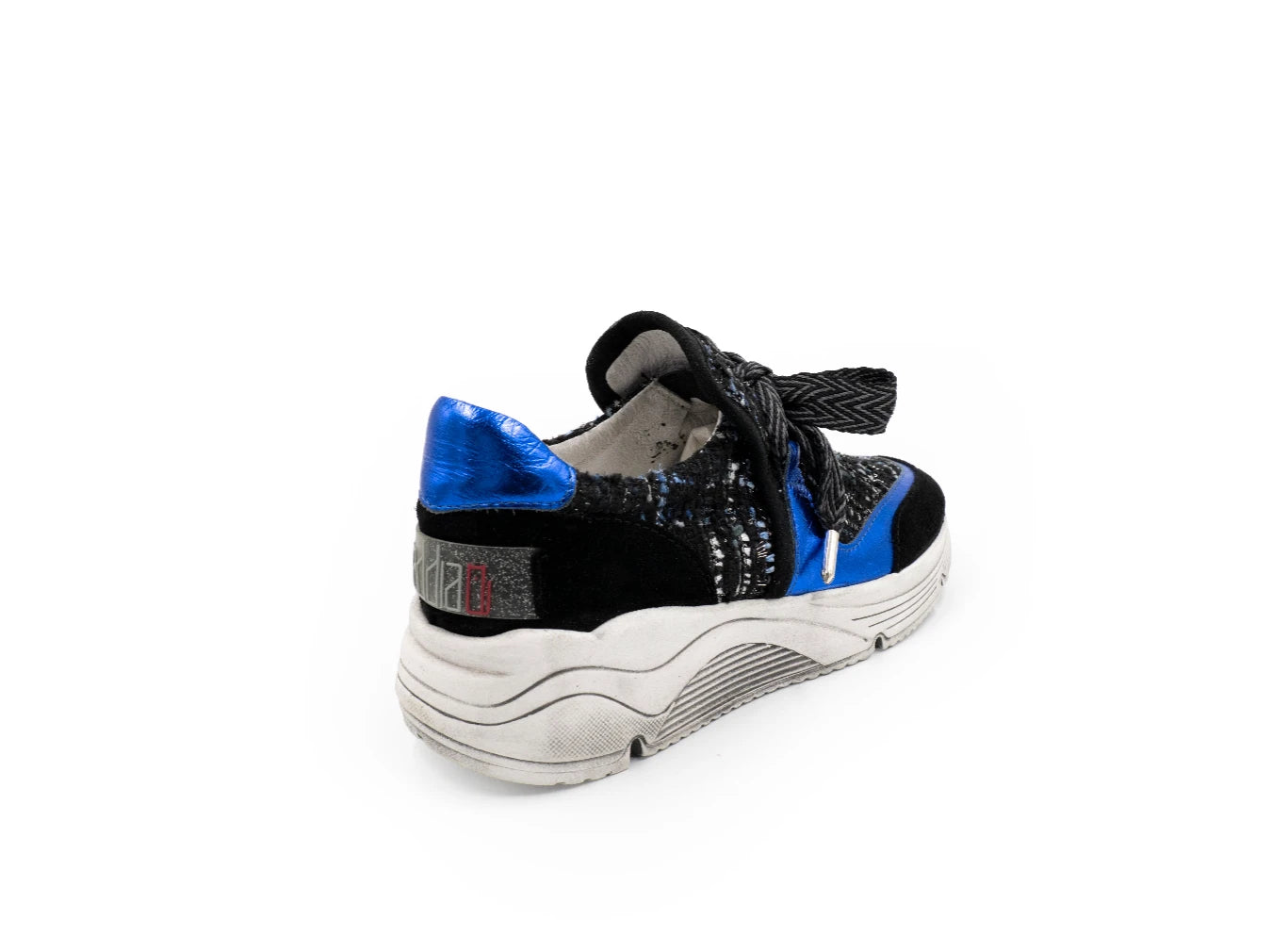 Black and blue sneaker with white sole on a white background