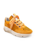 Yellow sneaker with white sole on a white background