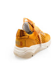 Orange sneaker with white sole on a white background