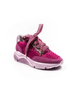 Pink perforated sneakers.