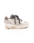 White perforated sneakers.