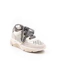 White perforated sneakers.