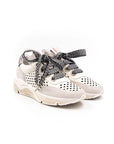 White perforated sneakers.