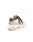White perforated sneakers.