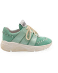 A green sneaker with lace-up closure, featuring a removable insole and reinforced arch.