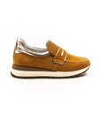 Orange perforated sneakers.