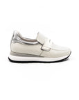 White perforated sneakers.