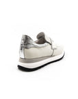 White perforated sneakers.