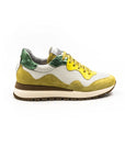 White and yellow perforated sneakers.