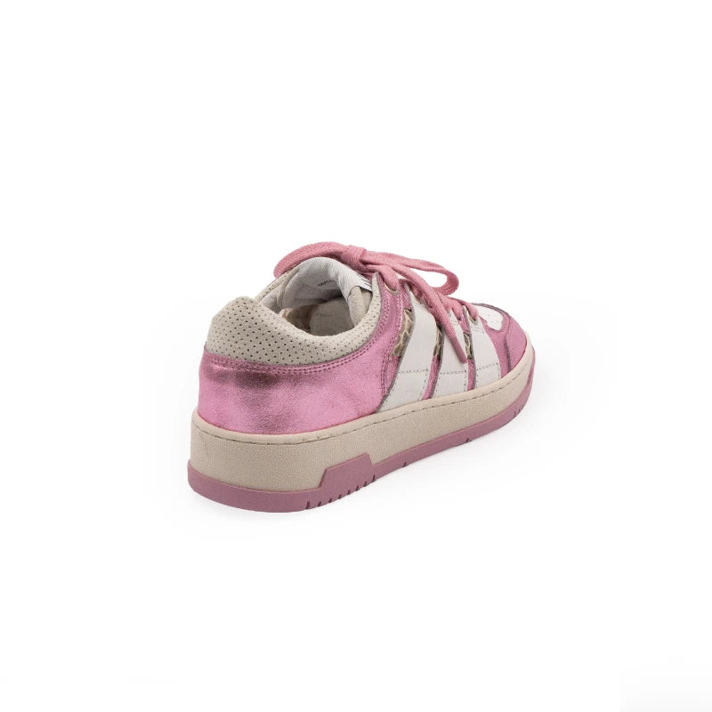Pink and white sneakers with lace-up closure, featuring a low-top design and a flat sole.