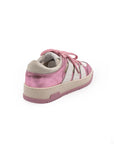 Pink and white sneakers with lace-up closure, featuring a low-top design and a flat sole.