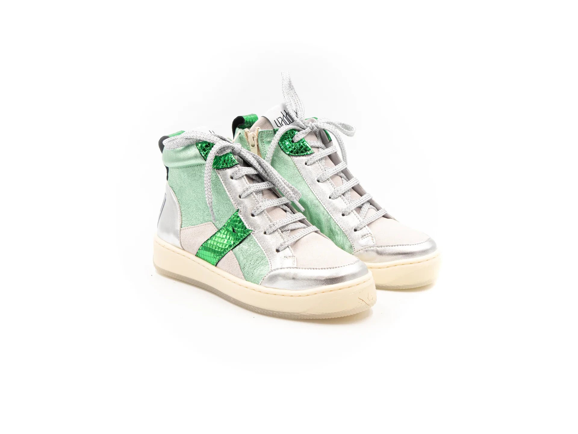 A high-top sneaker with a mix of silver and green colors, featuring a lace-up closure and a flat sole.