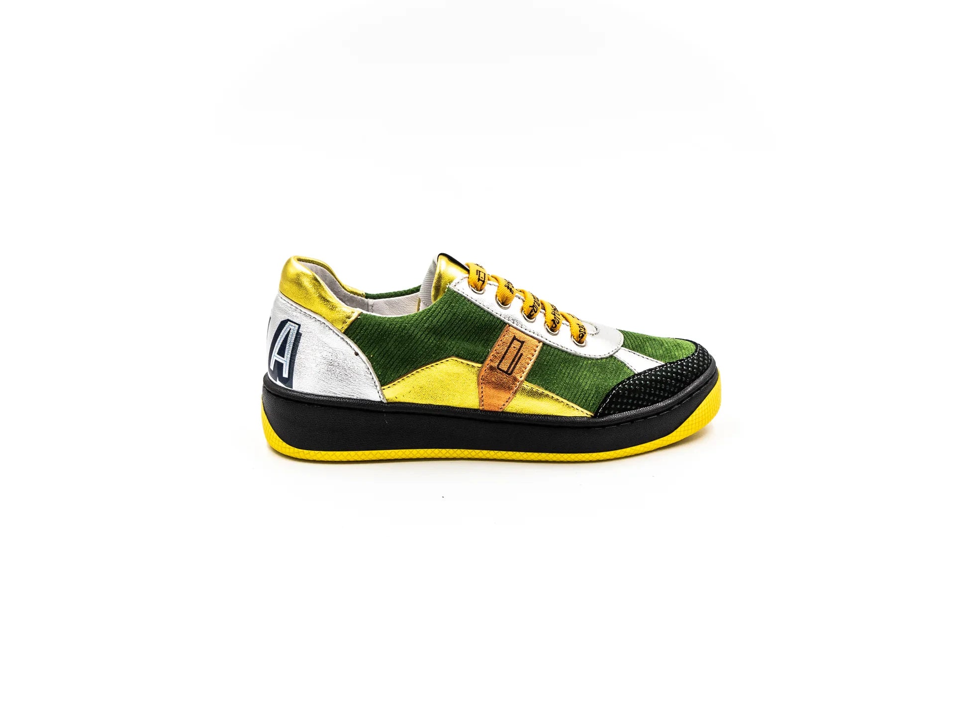 A sneaker with a mix of materials, featuring what appears to be a leather upper with a unique textured pattern, a white sole, and yellow laces.