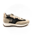 Beige sneakers with black mesh.