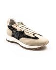 Beige sneakers with black mesh.