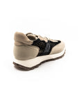 Beige sneakers with black mesh.