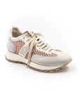 Grey and beige sneakers with pink netting.