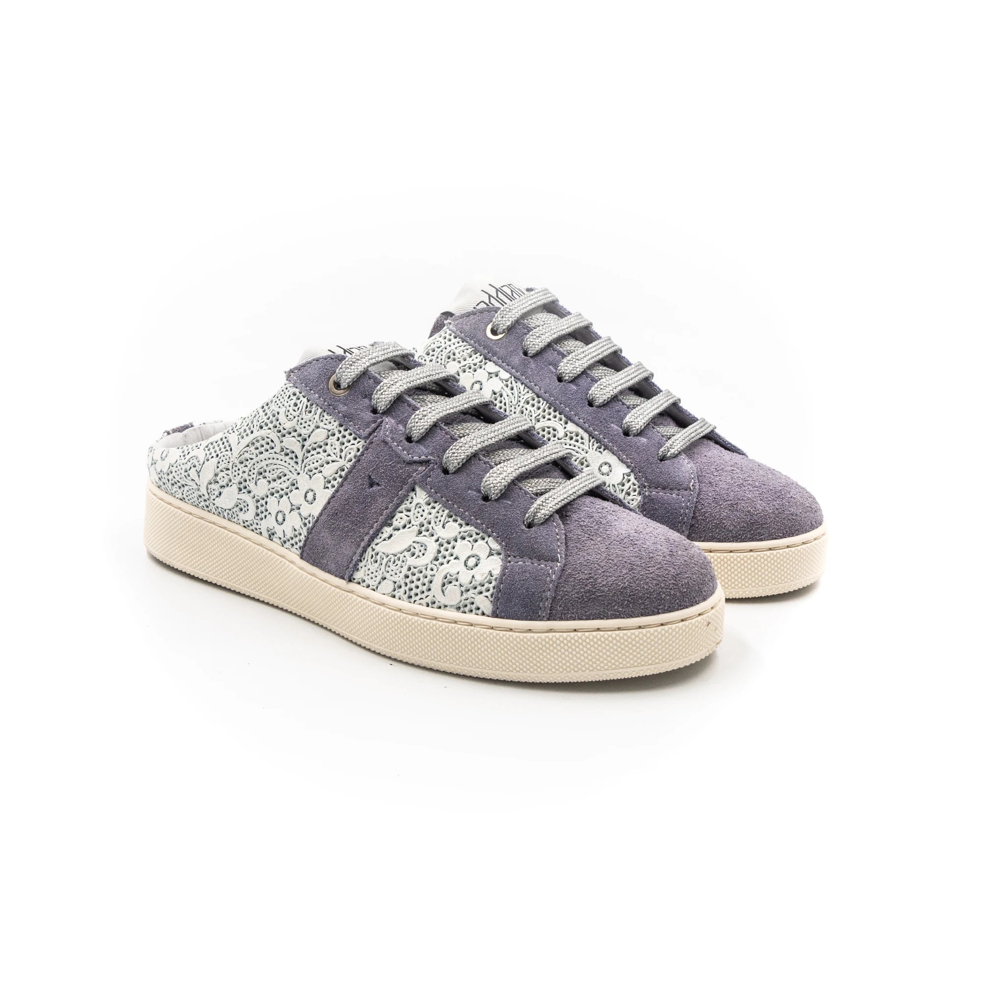 Purple sneakers with white lace and beige rubber.