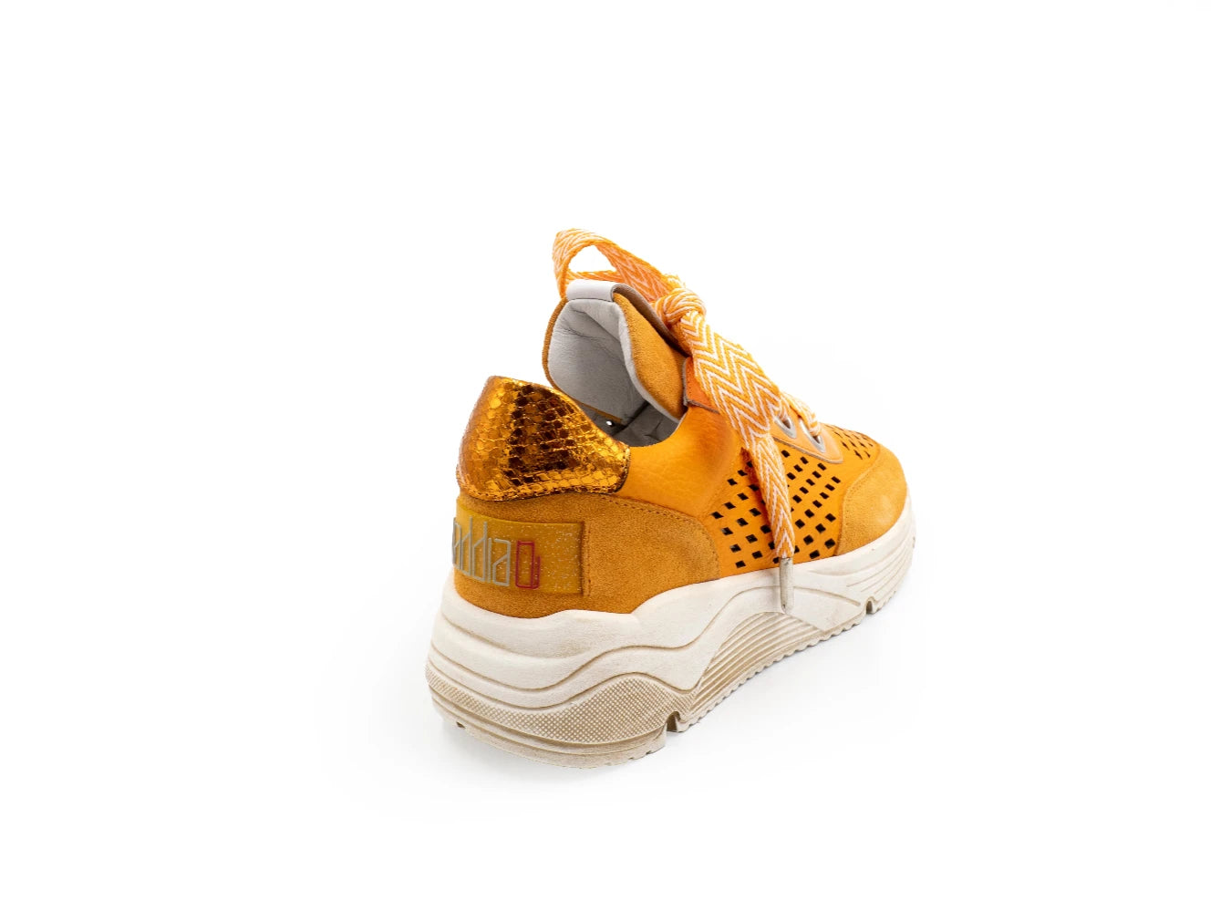 Orange sneaker with white sole on a white background