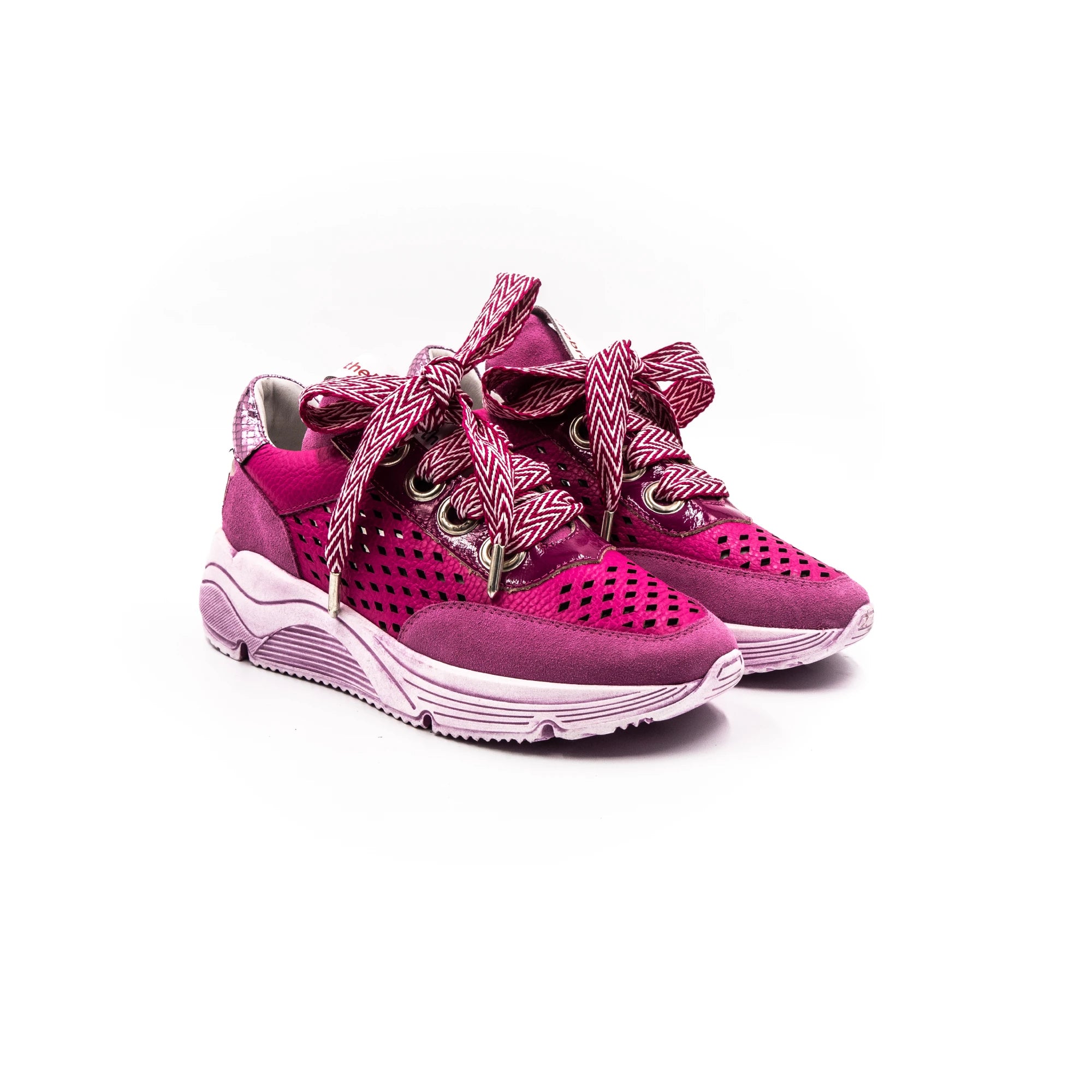 Pink perforated sneakers.