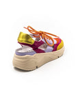 Colorful sneakers, open on the side and on the heels.