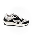Black and white perforated sneakers.