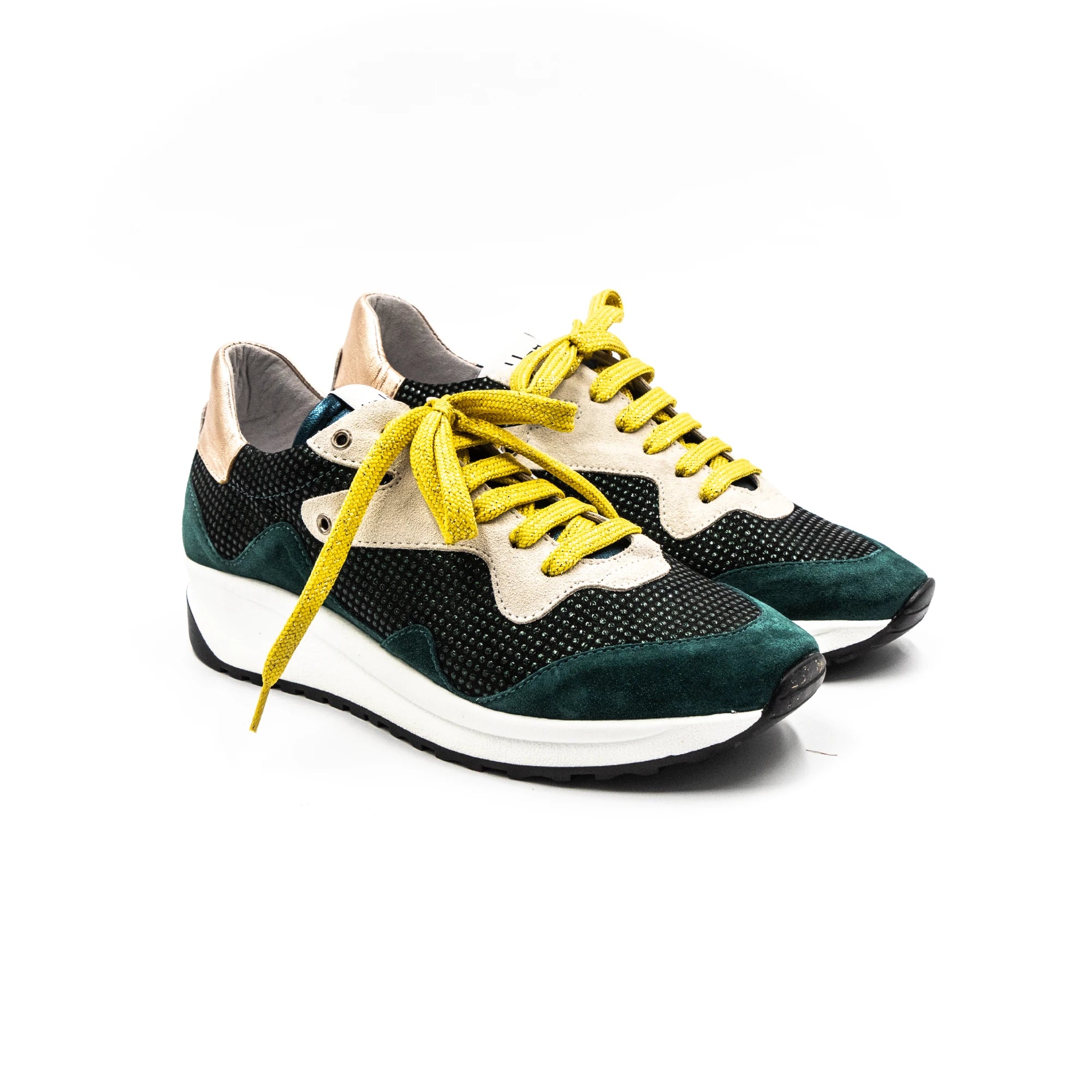 Green sneakers with yellow laces.
