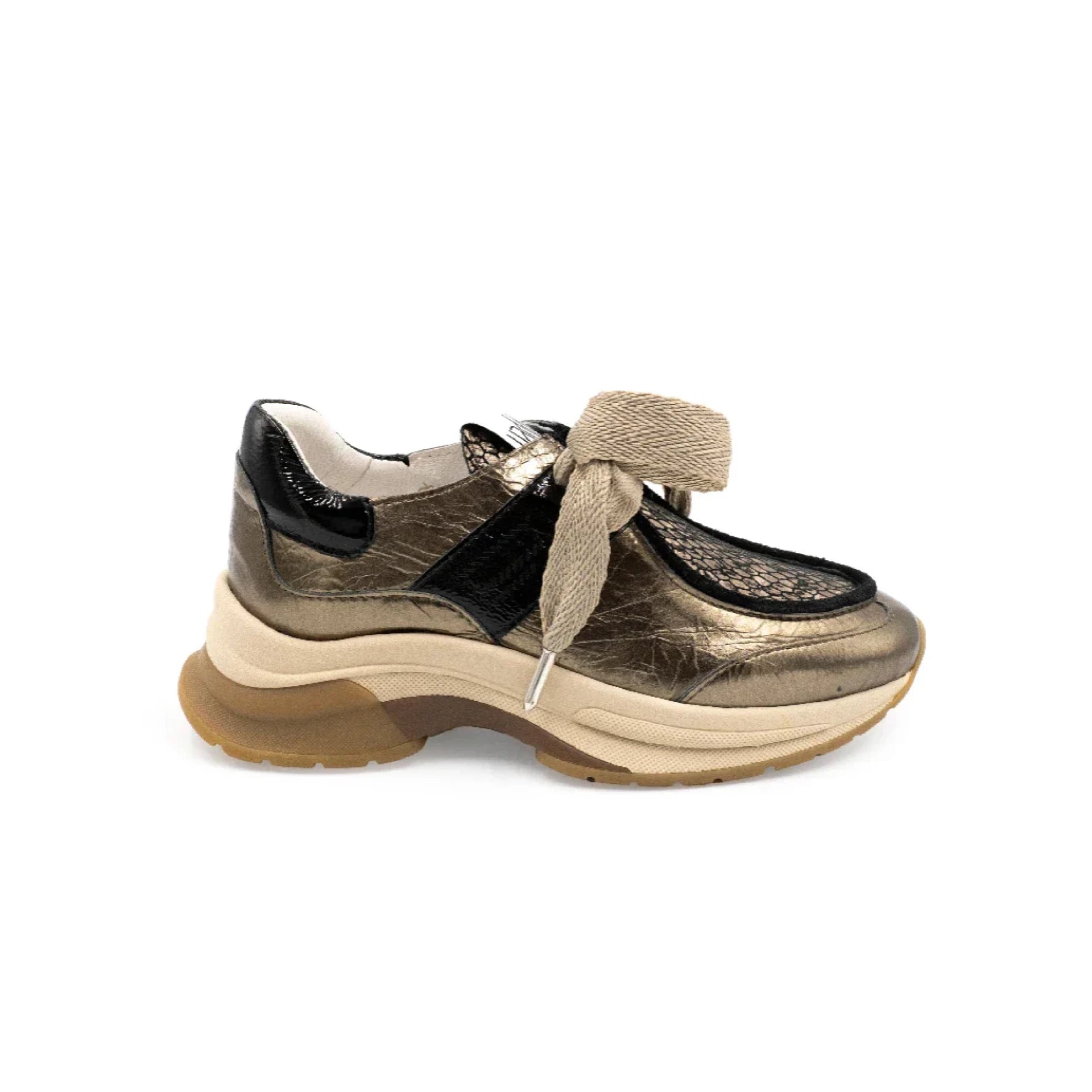 Gold and black sneaker with a thick sole on a white background