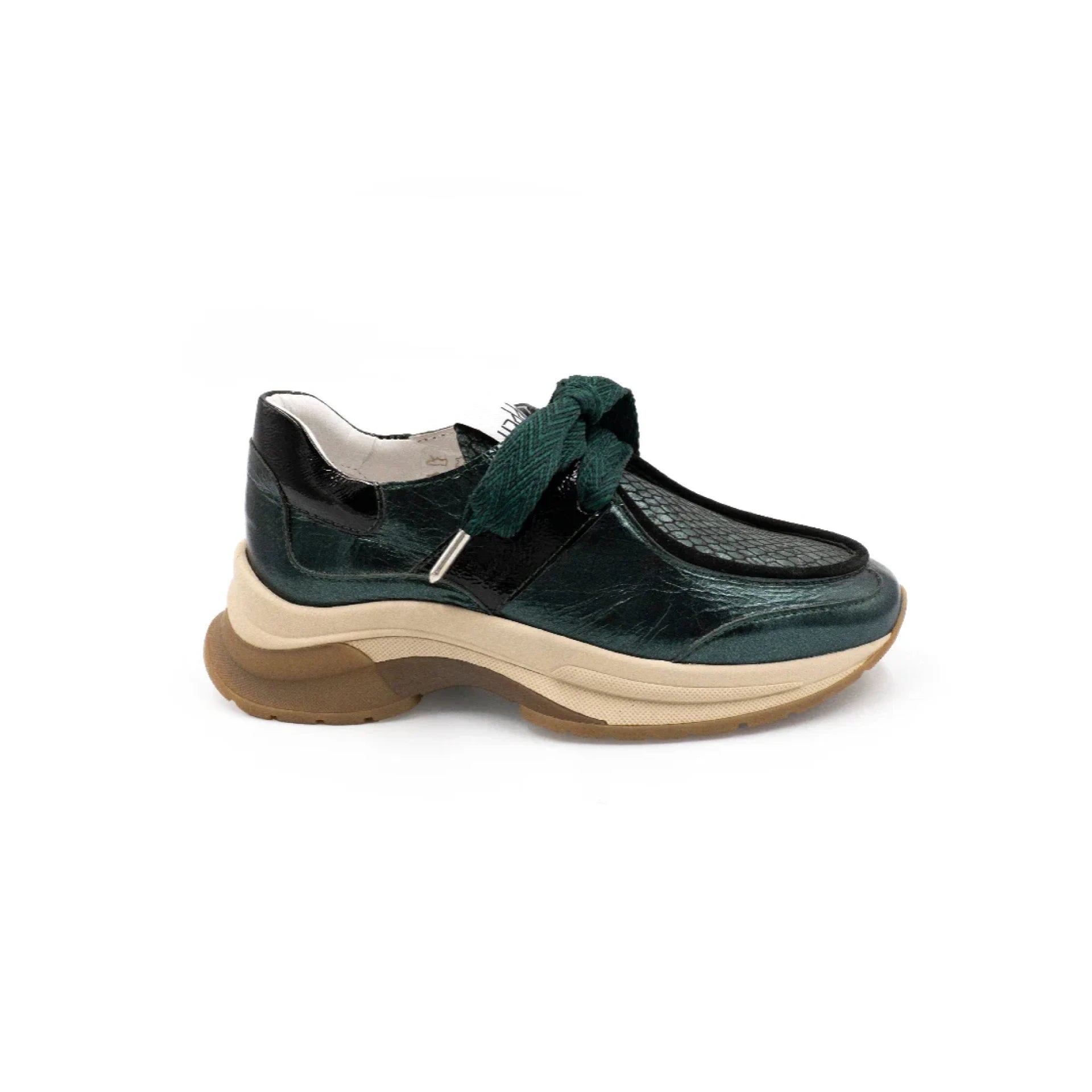 Green shoe with a thick sole on a white background