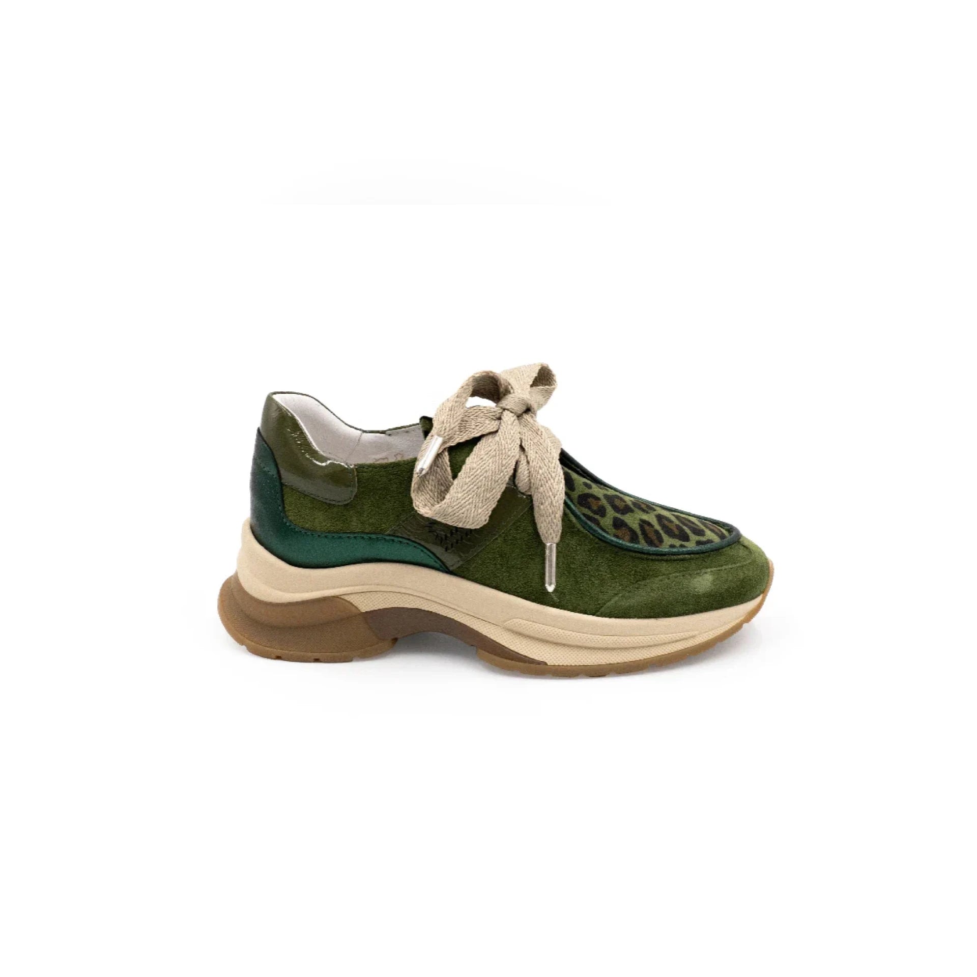 Green sneaker with leopard print accents on a white background