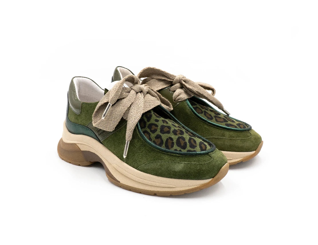 Green suede shoes with leopard print and beige laces on a white background